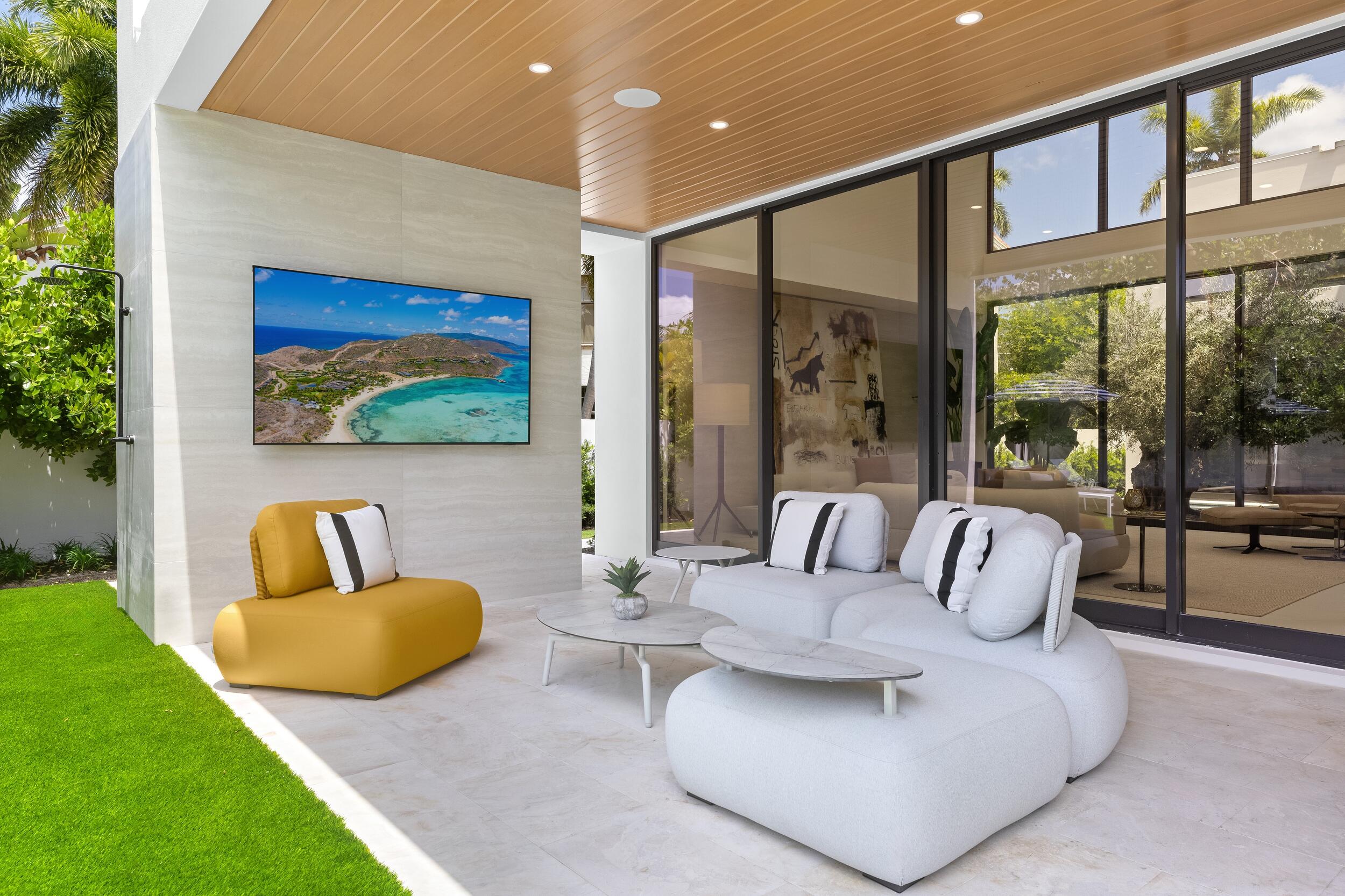 1351 Cocoanut Road Boca Raton, FL 33432 - Photo 50 of 101 a living room with furniture and a large window