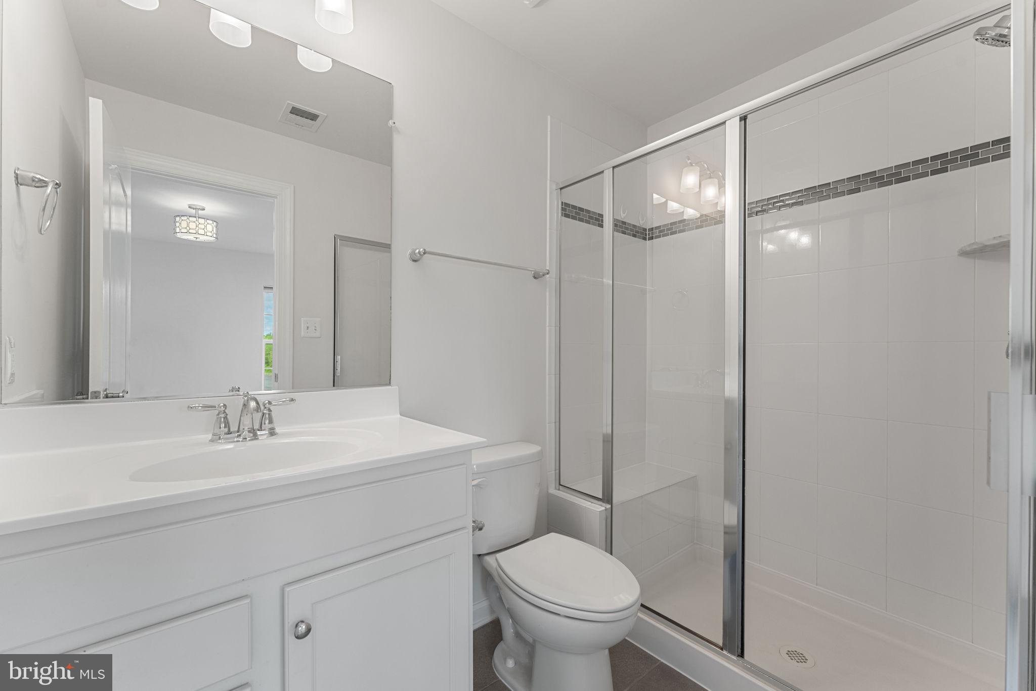 7418 Riding Meadow Way, Unit 25 Manassas, VA 20111 - Photo 17 of 36 Primary ensuite bathroom