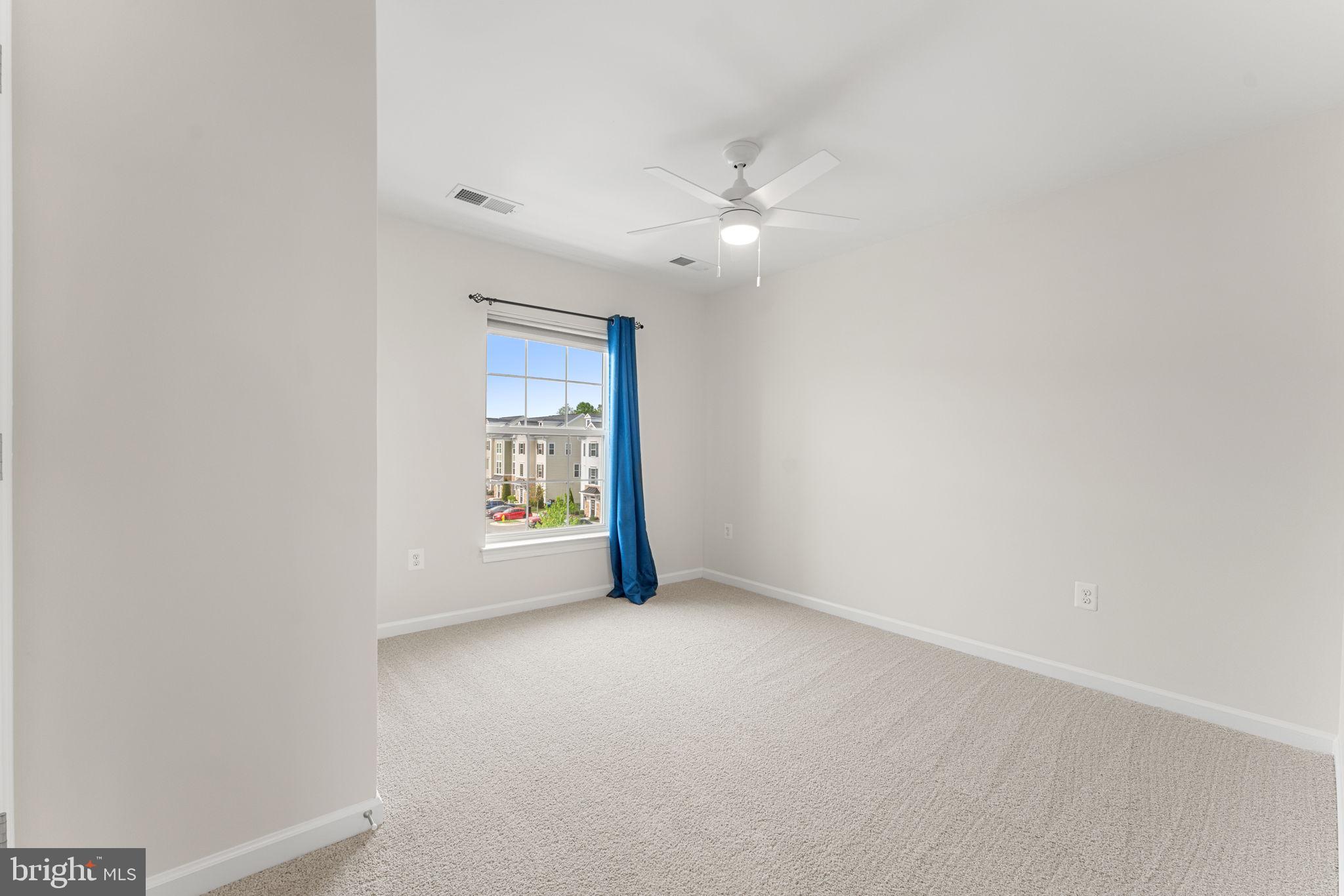 7418 Riding Meadow Way, Unit 25 Manassas, VA 20111 - Photo 18 of 36 Second upstairs bedroom