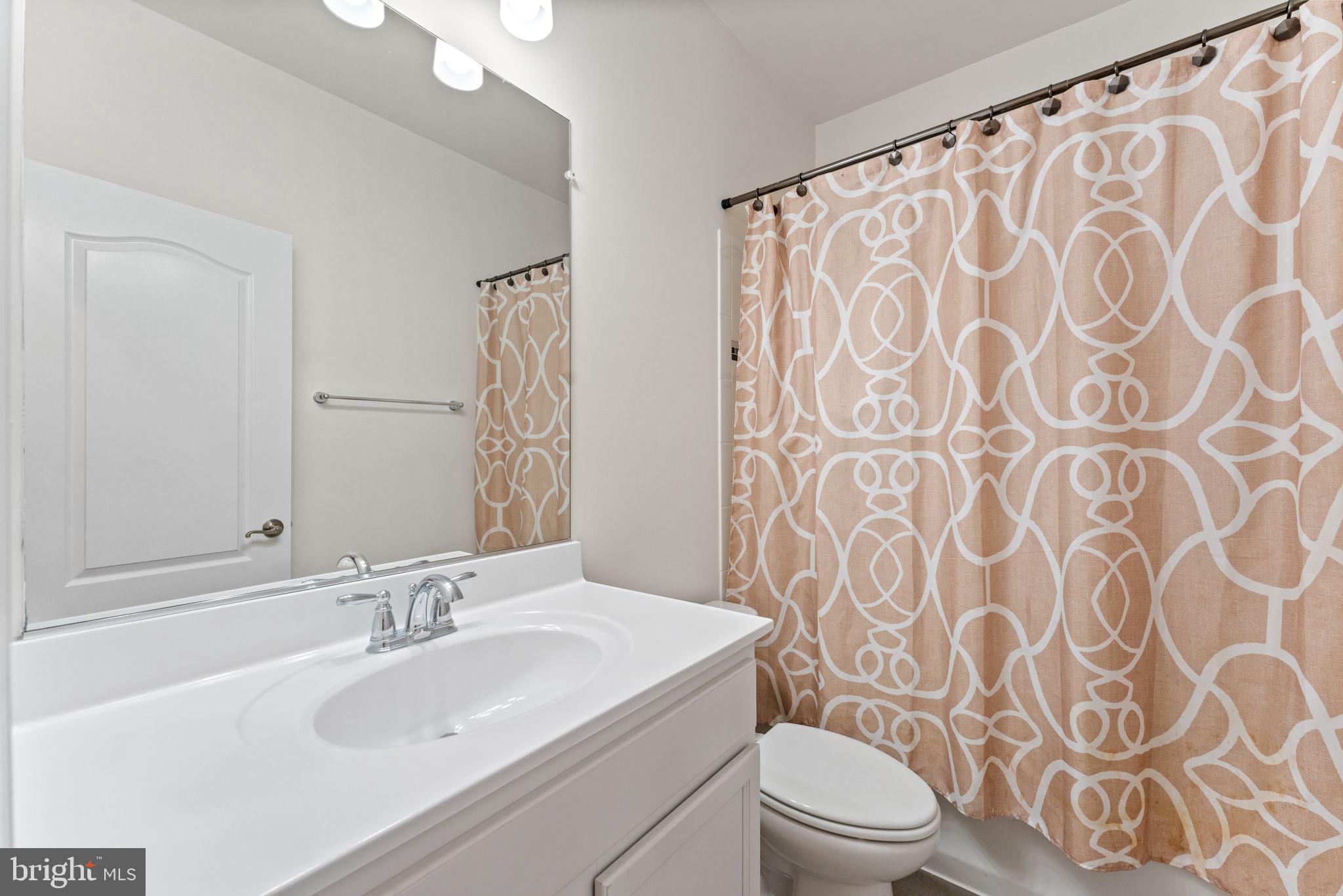 7418 Riding Meadow Way, Unit 25 Manassas, VA 20111 - Photo 23 of 36 Downstairs bathroom
