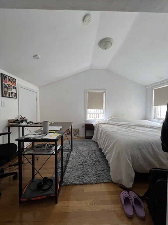 89 Spring Street, Unit 3 Cambridge, MA 02141 - Photo 9 of 9 a bedroom with a bed and a window