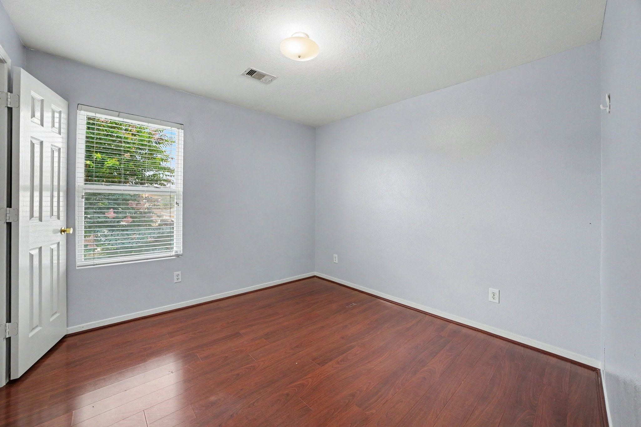 5622 Wasabi Lane Baytown, TX 77521 - Photo 22 of 29 an empty room with a window