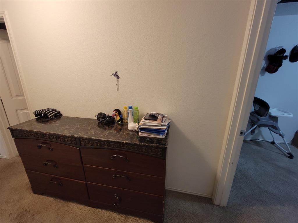 3610 Batson Drive Austin, TX 78725 - Photo 20 of 30 a bathroom with a granite countertop sink and a mirror