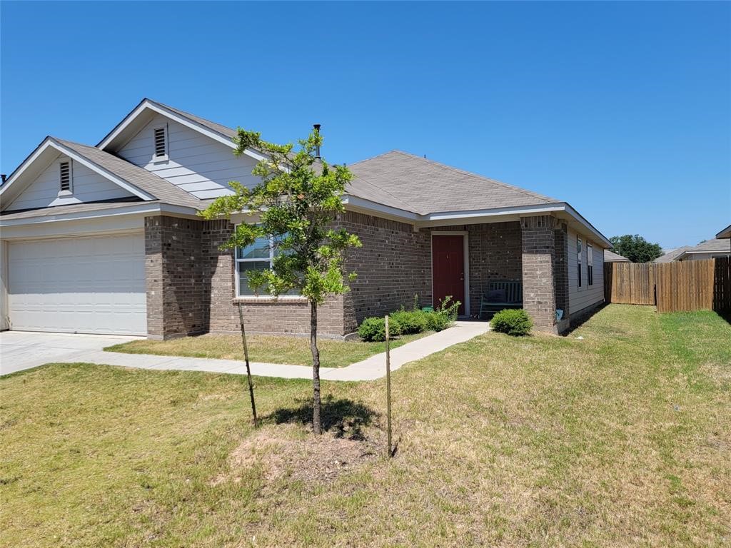 3610 Batson Drive Austin, TX 78725 - Photo 2 of 30 a front view of a house with garden