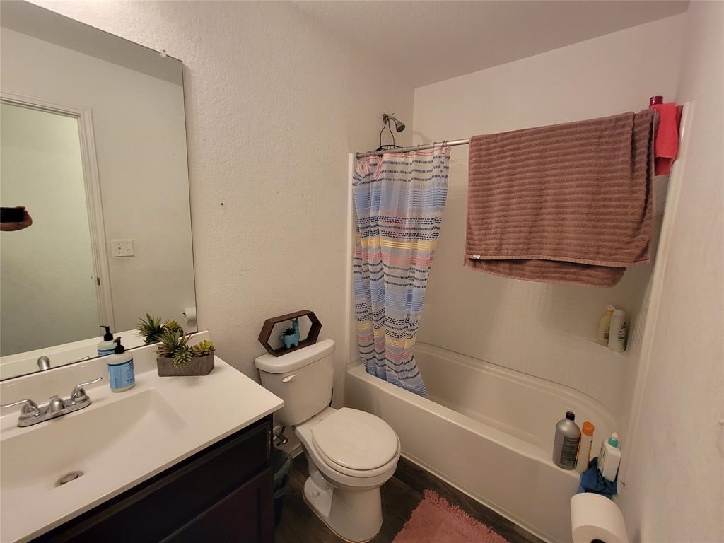 3610 Batson Drive Austin, TX 78725 - Photo 24 of 30 a bathroom with a sink toilet and shower
