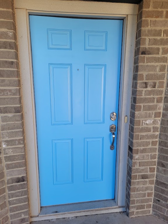 3610 Batson Drive Austin, TX 78725 - Photo 4 of 30 a view of door wooden door