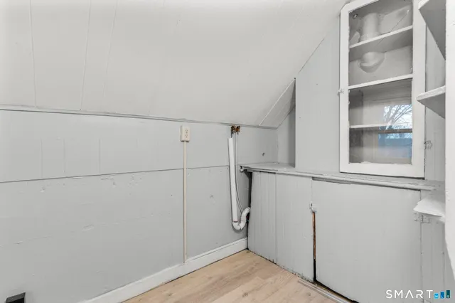 a view of a room with rack on the wall