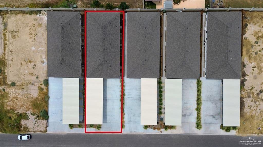 5323 Vision Street, Unit B Rio Grande City, TX 78582 - Photo 12 of 13 a view of a building from a balcony