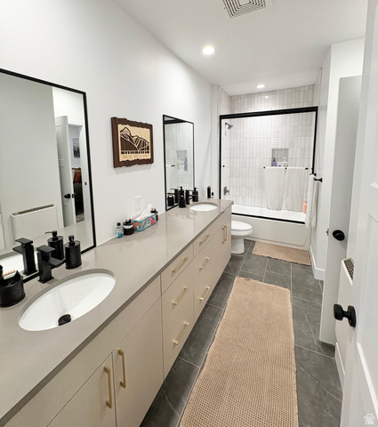 70 East Hwy 153, Unit A4 Beaver, UT 84713 - Photo 10 of 19 Full bathroom with double vanity, enclosed tub / shower combo, recessed lighting, and dark tile patterned flooring
