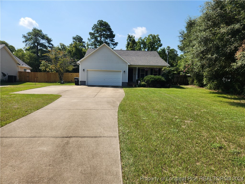 a front view of a house with yard