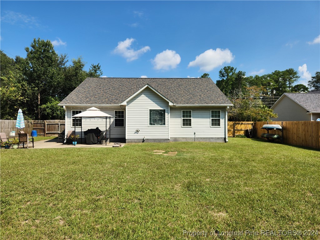 6723 Camden Road Fayetteville, NC 28306 - Photo 18 of 18 a aerial view of a house with a yard