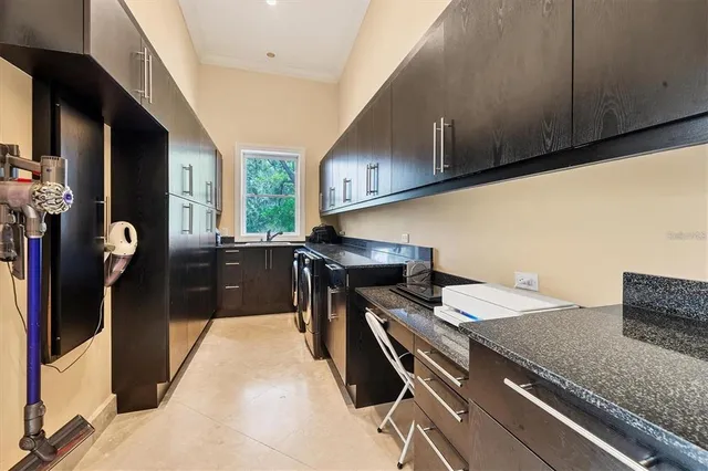 a view of a house with a tree