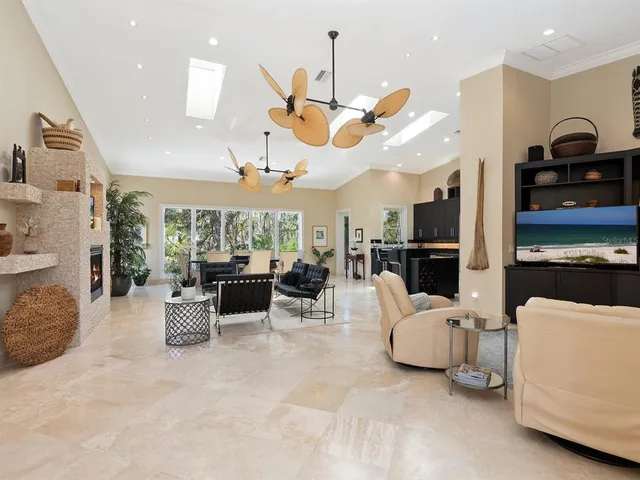 a spacious bathroom with a double vanity sink a mirror and a bathtub