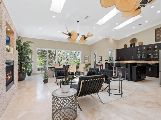a bath tub sitting in a bathroom next to a window