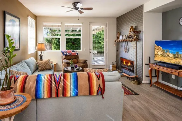 a bedroom with furniture and a window