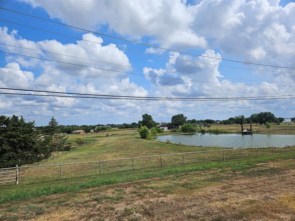 521 Blue Mound Road East Haslet, TX 76052 - Photo 2 of 7 a view of a lake