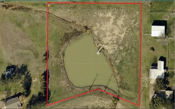 a bathroom with a shower and a mirror