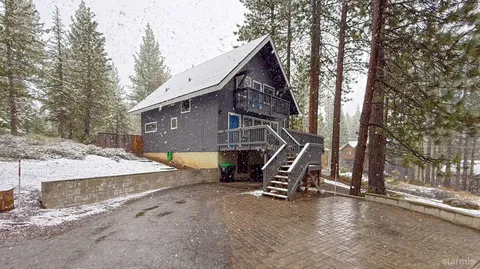 a view of a back yard of the house