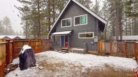 a house with trees in front of it