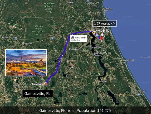 a view of a lake with a building in the background