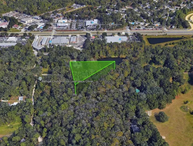 a view of a yard with an umbrella