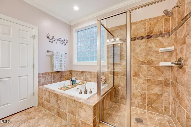 a spacious bathroom with a double vanity sink double and mirror