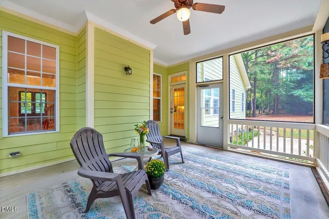 a view of an empty room with a stairs