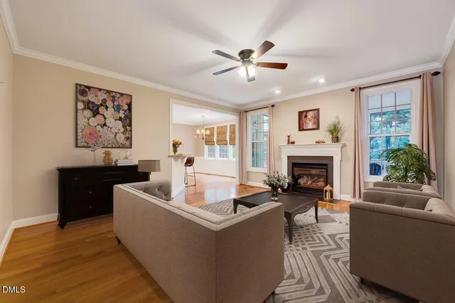 a view of a room with wooden floor and staircase
