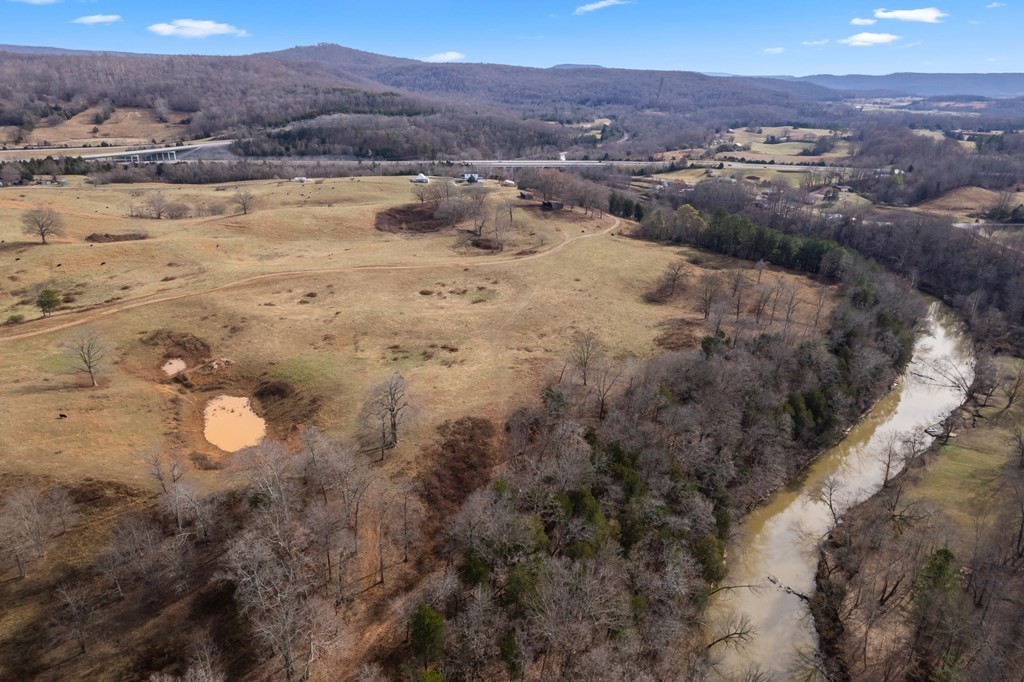 899 Messenger Road Sparta, TN 38583 - Photo 34 of 68 a view of a lake with mountains in the background
