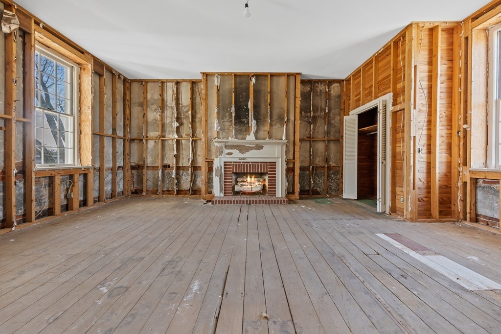 899 Messenger Road Sparta, TN 38583 - Photo 46 of 68 a view of an empty room with wooden floor and a window