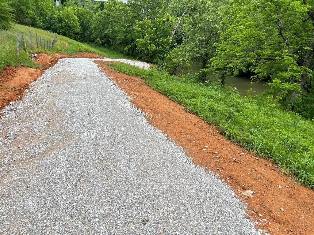 899 Messenger Road Sparta, TN 38583 - Photo 56 of 68 a view of a road with a yard