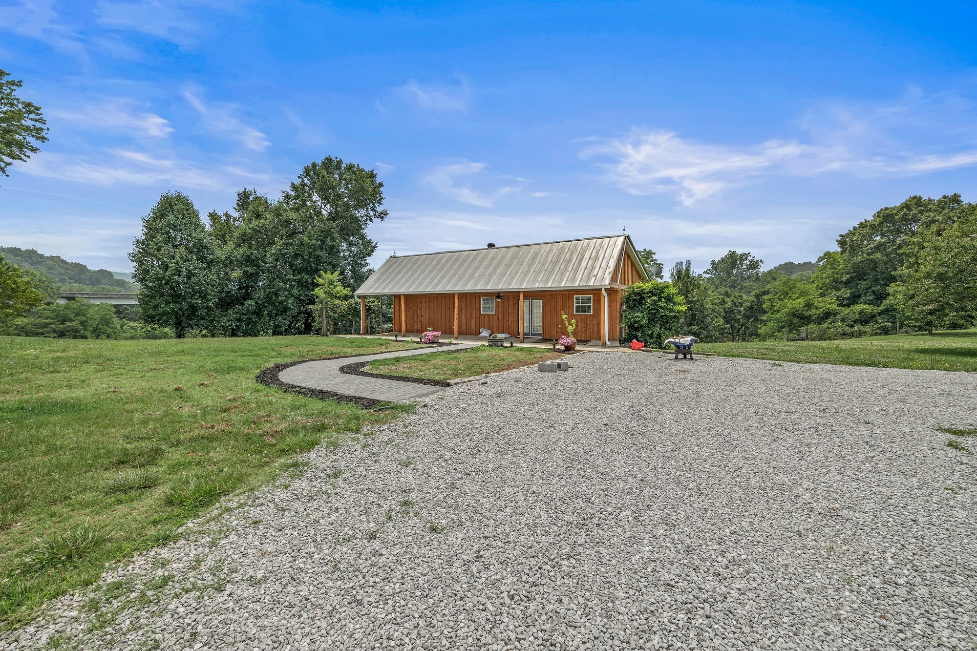 899 Messenger Road Sparta, TN 38583 - Photo 61 of 68 a view of a house with a yard