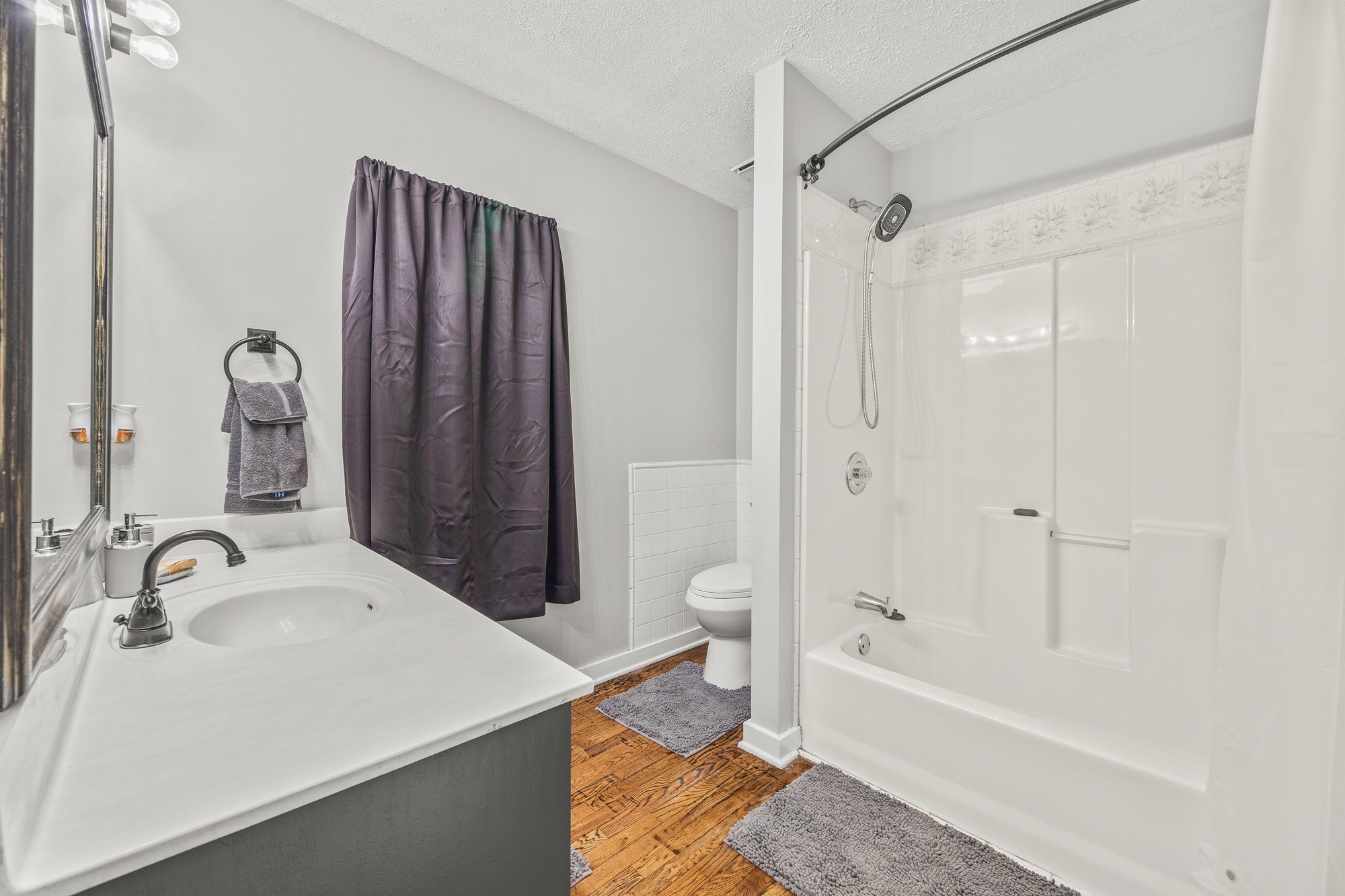 899 Messenger Road Sparta, TN 38583 - Photo 68 of 68 a bathroom with a sink a toilet and a bathtub