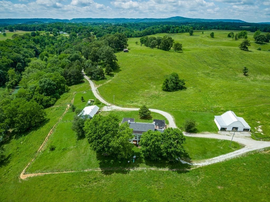 899 Messenger Road Sparta, TN 38583 - Photo 9 of 68 a view of a golf course with a garden