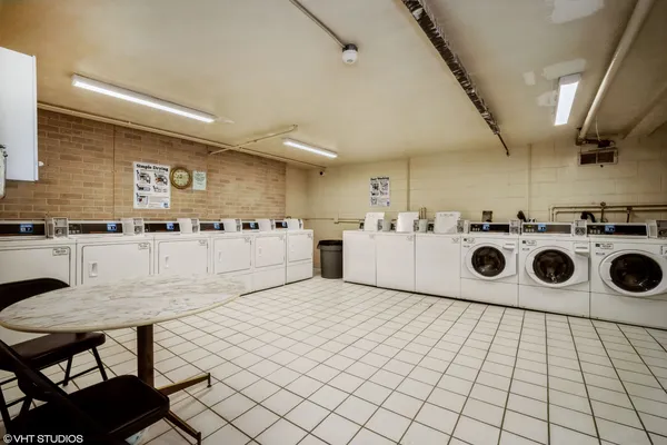 a utility room with washer and dryer