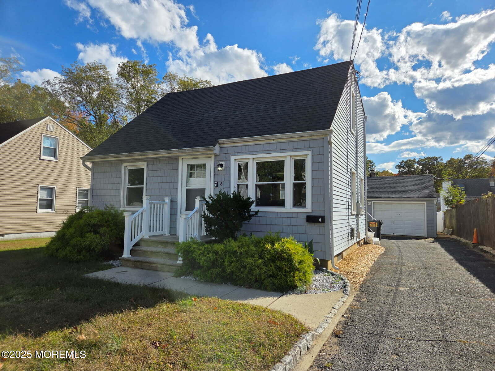 6 Trumen Place, Unit 1 Keansburg, NJ 07734 - Photo 1 of 19 a front view of house with yard and green space