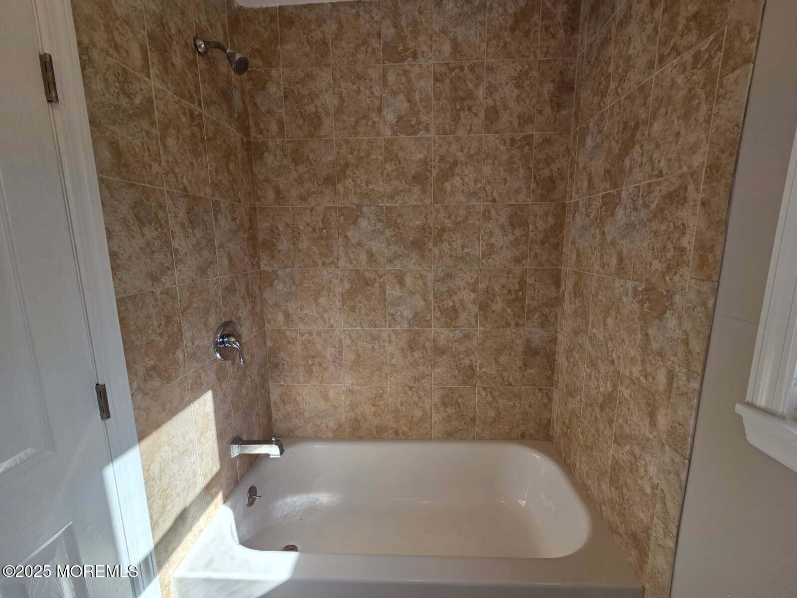 6 Trumen Place, Unit 1 Keansburg, NJ 07734 - Photo 9 of 19 a close view of a bathtub in bathroom