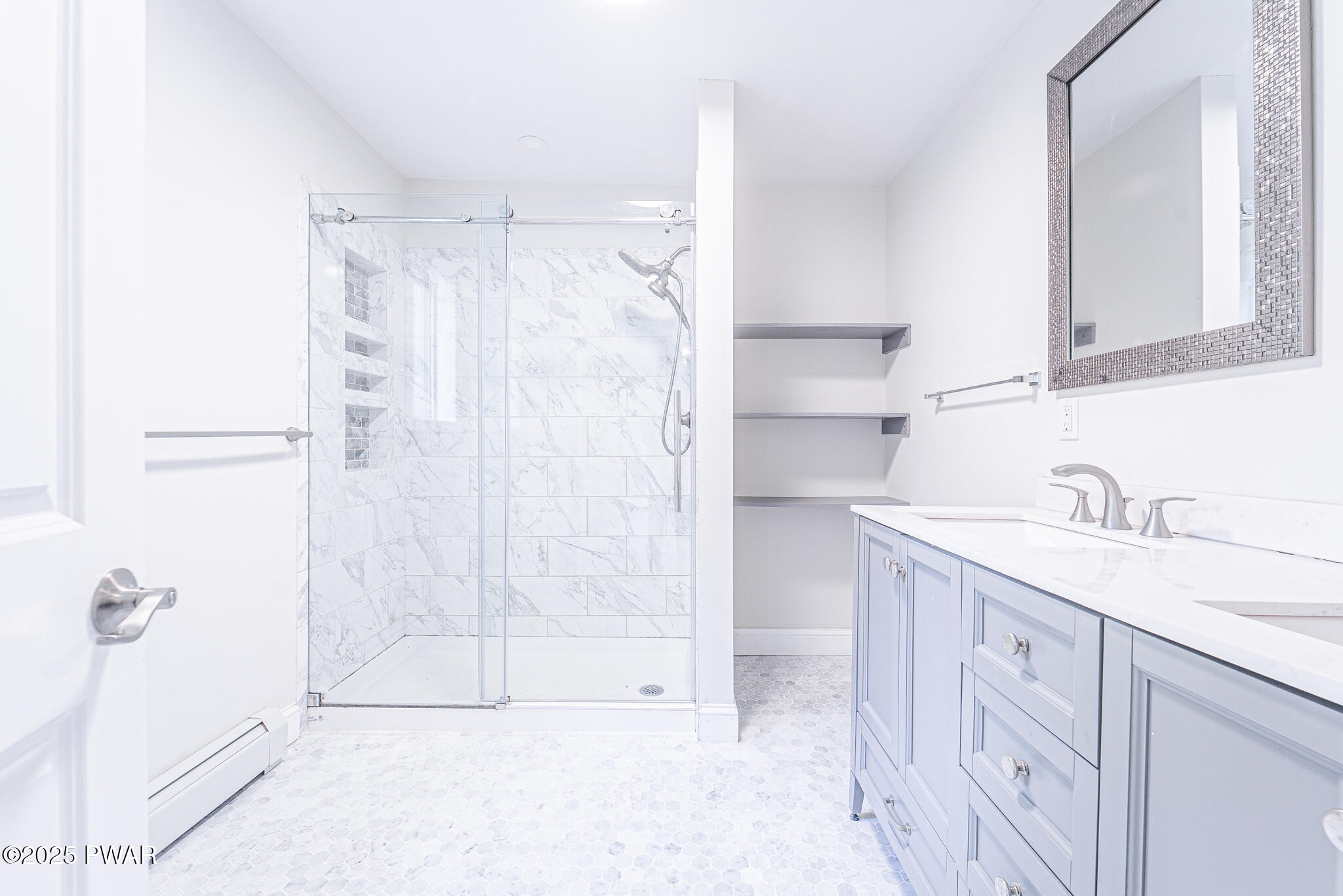 153 Hatton Road Hawley, PA 18428 - Photo 16 of 38 a bathroom with a granite countertop sink a mirror and shower