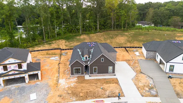 a view of a yard with an outdoor space and seating area
