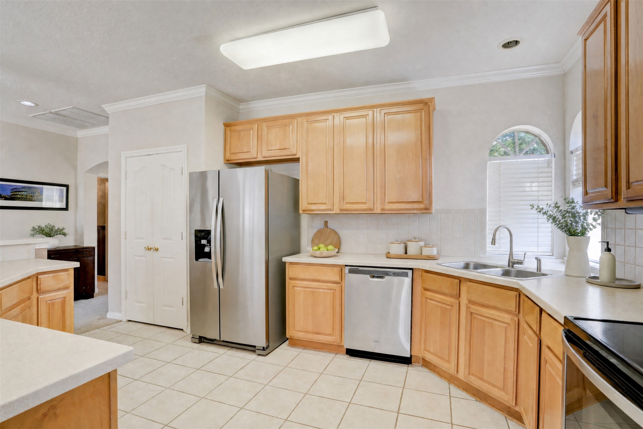 7022 Treaschwig Road Spring, TX 77373 - Photo 5 of 18 Original kitchen that has held up well. Fully functional with solid layout and storage. A remodel here would completely transform the space.