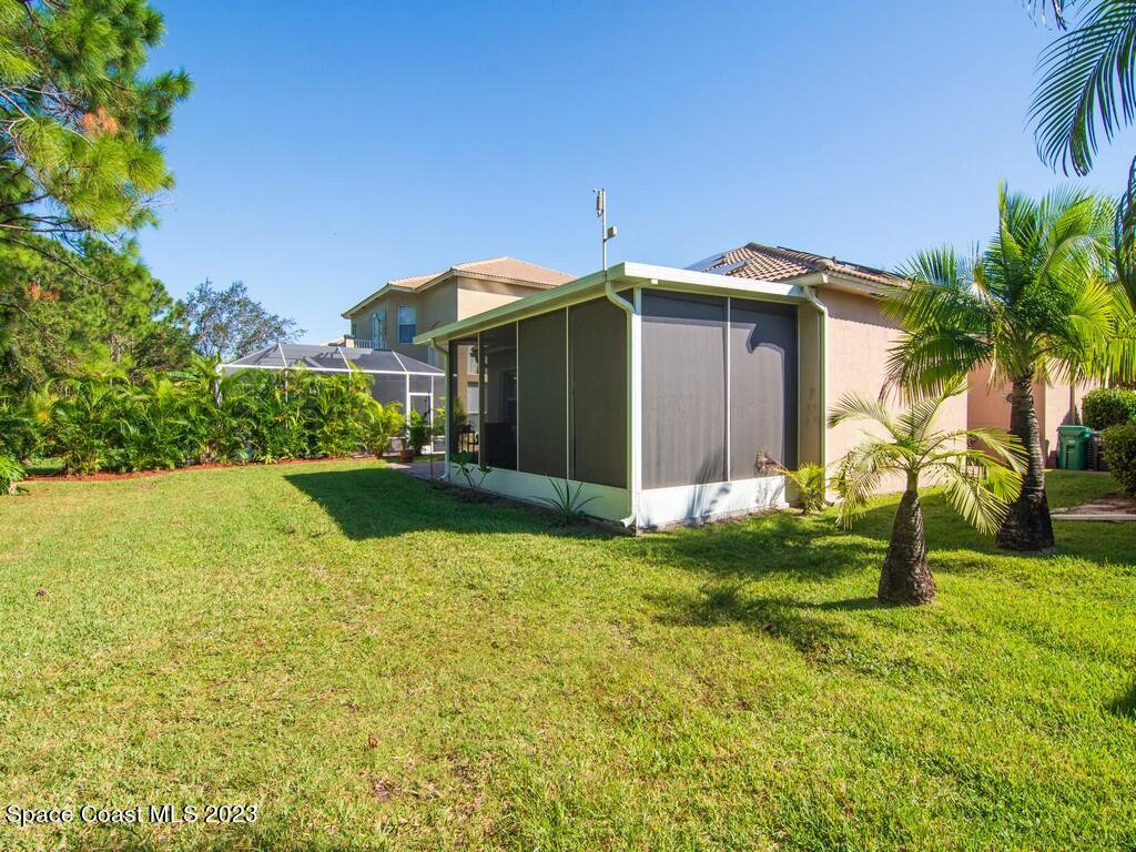 5621 Spanish River Road Fort Pierce, FL 34951 - Photo 20 of 34 a view of a back yard of the house