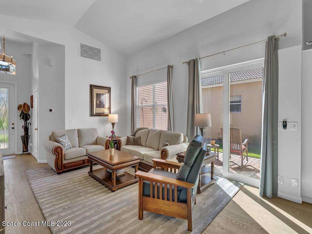 5621 Spanish River Road Fort Pierce, FL 34951 - Photo 2 of 34 a living room with furniture and a large window