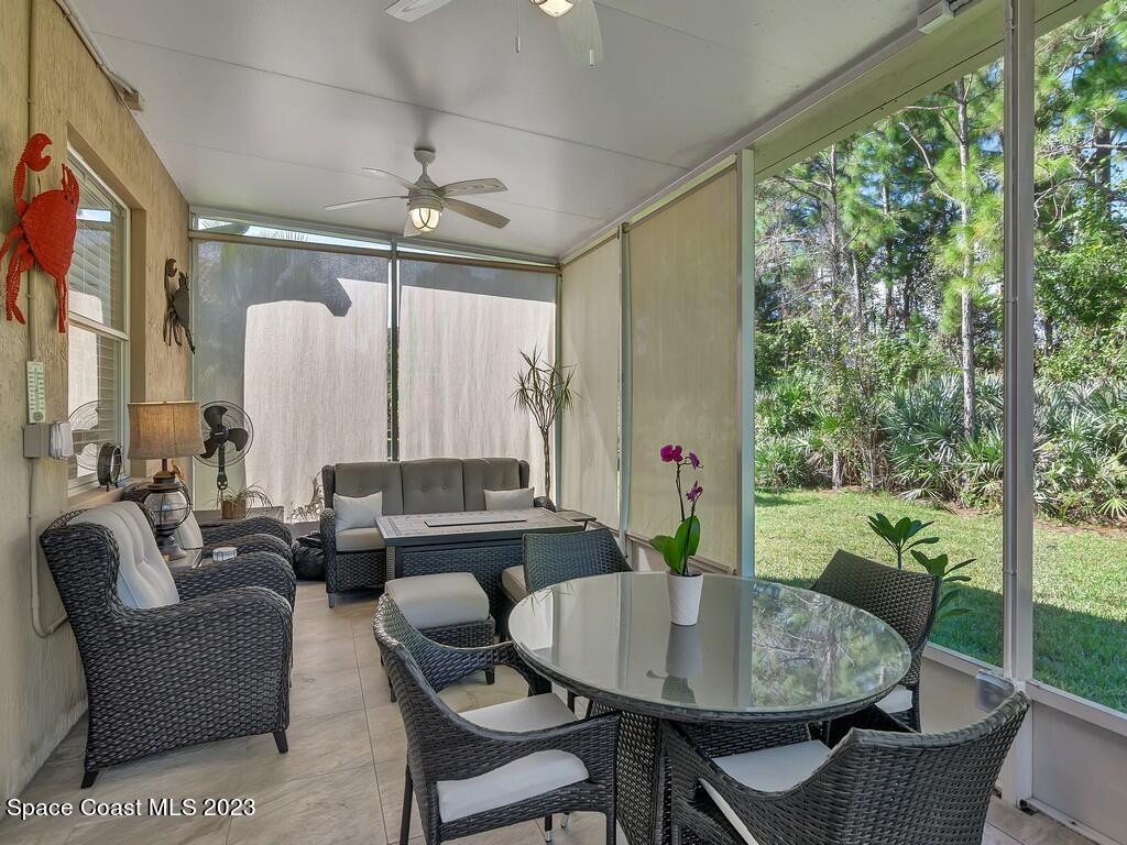 5621 Spanish River Road Fort Pierce, FL 34951 - Photo 23 of 34 a living room with furniture and a large window