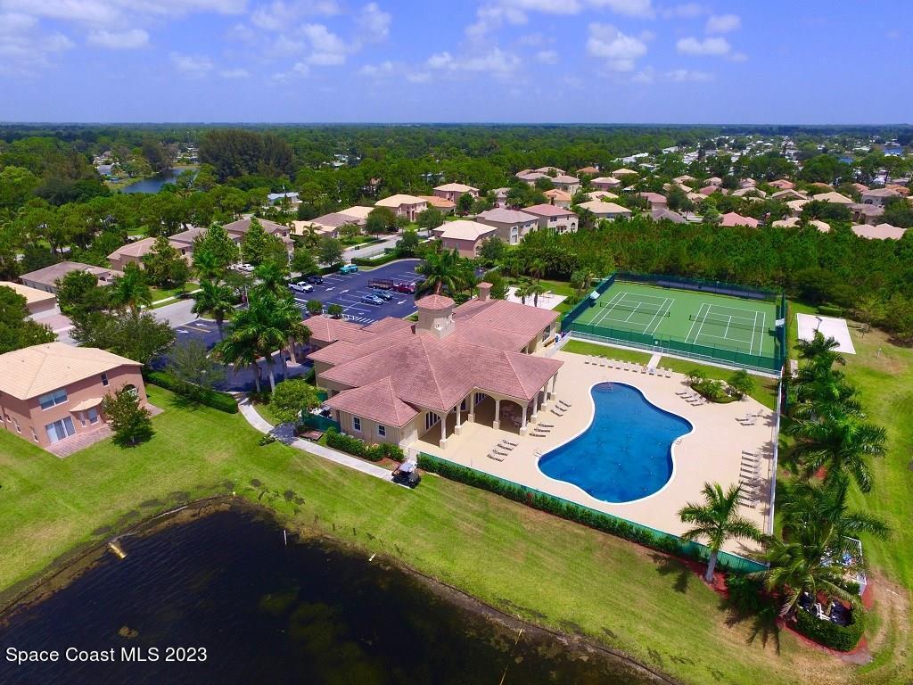 5621 Spanish River Road Fort Pierce, FL 34951 - Photo 25 of 34 an aerial view of house with yard swimming pool and outdoor seating
