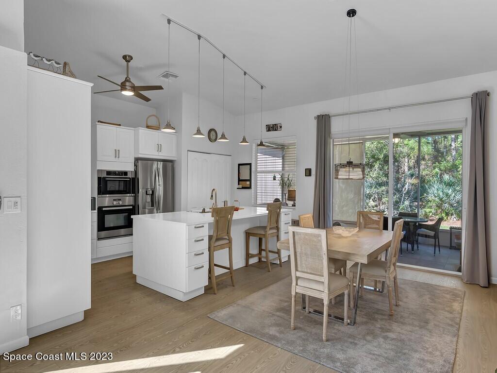 5621 Spanish River Road Fort Pierce, FL 34951 - Photo 6 of 34 a view of a dining room with furniture window and outside view