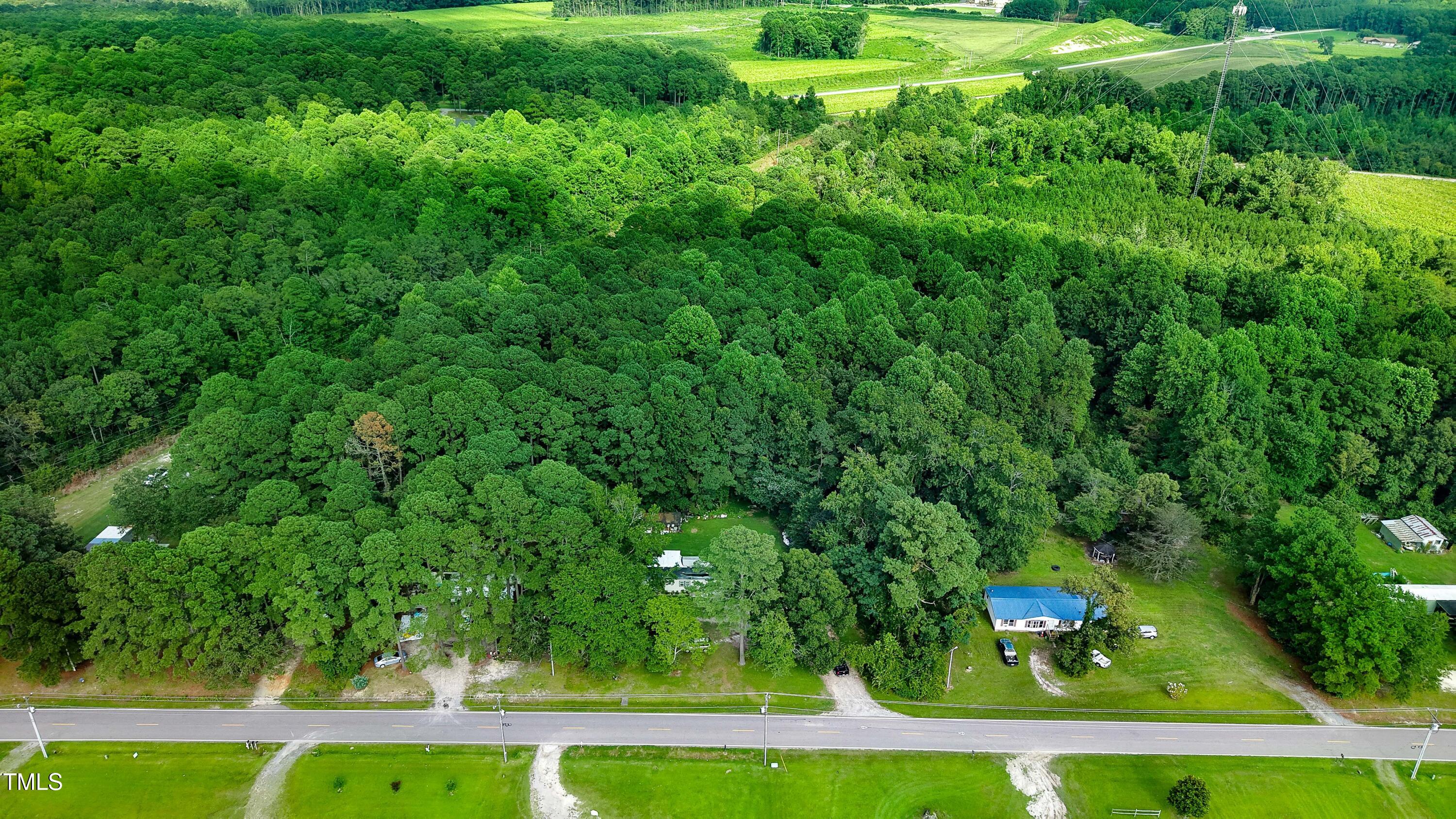 2057 Old Rock Quarry Road Princeton, NC 27569 - Photo 4 of 7 a view of a yard