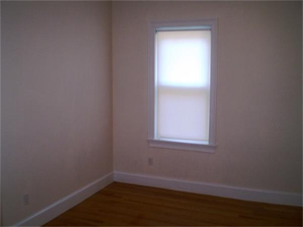 111 Heath Street Boston, MA 02120 - Photo 16 of 17 an empty room with a window