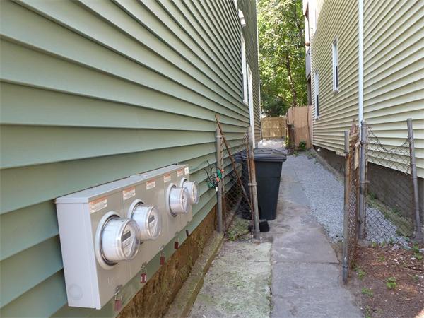 111 Heath Street Boston, MA 02120 - Photo 3 of 17 a view of a door and wooden deck