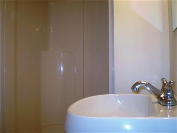 111 Heath Street Boston, MA 02120 - Photo 4 of 17 a bathroom with a tub
