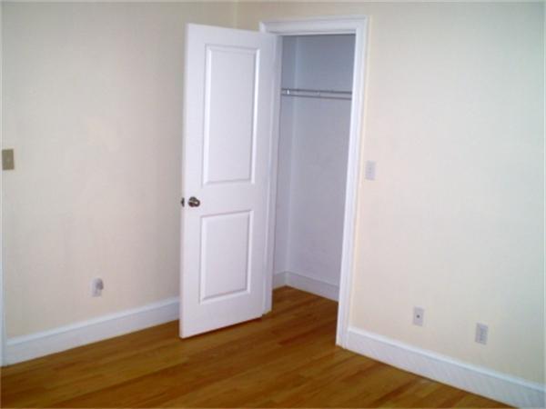 111 Heath Street Boston, MA 02120 - Photo 8 of 17 a view of empty room with wooden floor